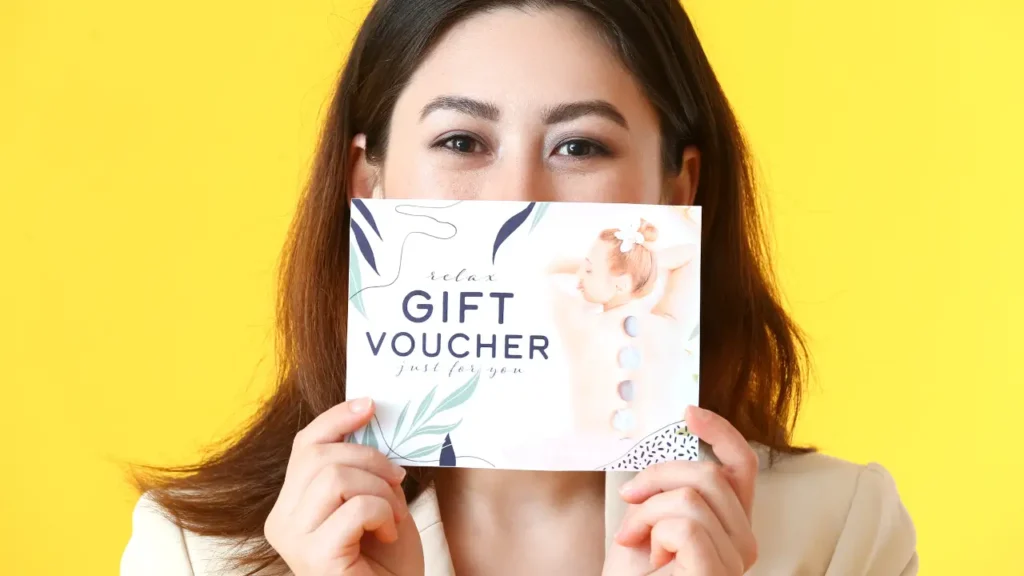 An employee given a surprise gifts of wellness voucher gift card