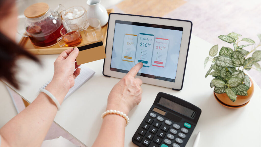 person selecting a subscription plan on a tablet