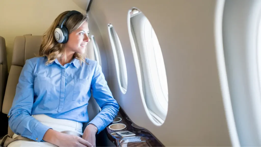 woman wearing Bluetooth headphones